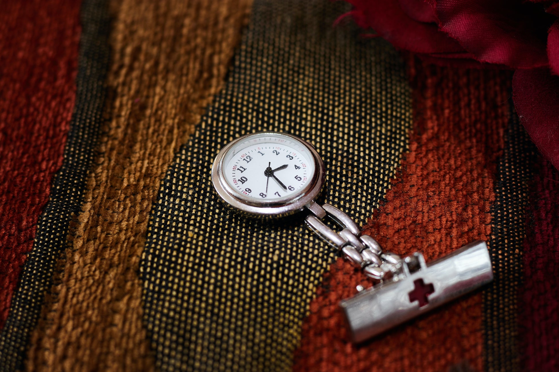 Bruchin Noeka silver pocket watch. Silver variant on a table cloth.