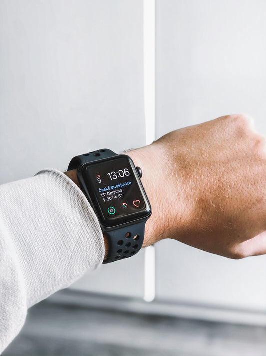 David Svihovec Polish smart watch. Black rubber band and black trim.