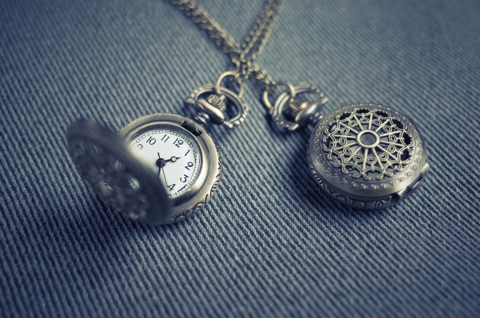 Elisha Terada silver engraved dual pocket watch. Silver variant with white face.