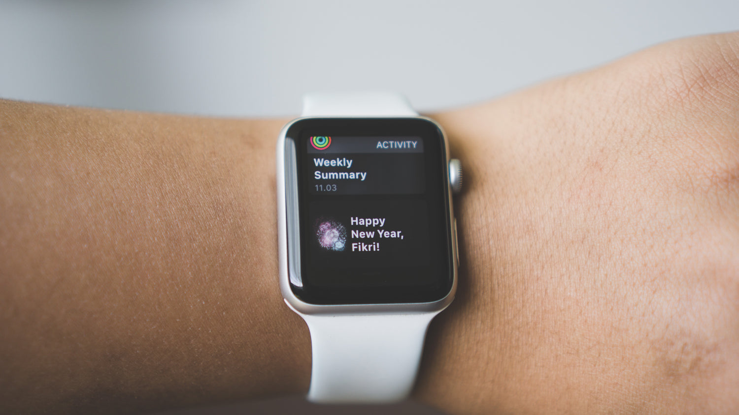 Fikri Rasyid smart watch. Watch with white band.