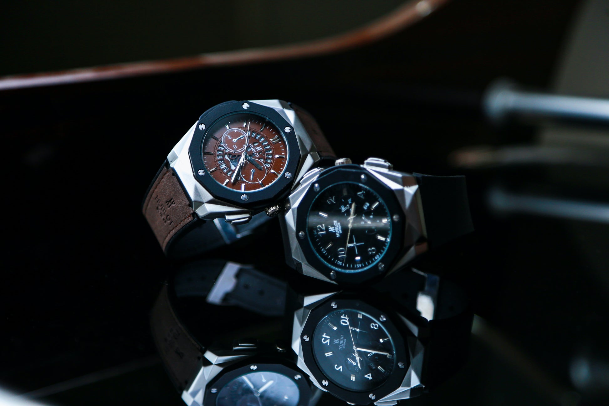 Shahrukh Rehman watch made by Hublot in Genieve, Switzerland. Leather bands and faces in brown and black.